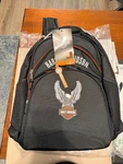 New - Harley Davidson Backpack Steel Cable Strap Eagle Black Orange Trim 99220. Fixed Price $100.00.