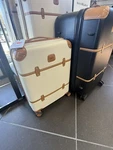 Brics Luggage 21" Carry On Bellagio 2.0 Ultra Light Rolling Suitcase - Cream. Fixed Price $466.00.
