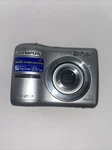 Olympus FE-210 7.1MP Digital Camera, Silver, For Parts Only. Fixed Price $8.99.