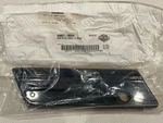 New Genuine Harley Left Black Saddlebag Faceplate 90857-06DH. Fixed Price $49.99.