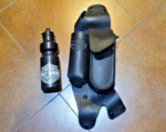 Harley Davidson Genuine Saddlebag Guard W/ Water Bottle Holder Right Side. Fixed Price $67.50.
