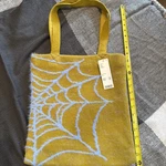 Urban Outfitters Ellie Tote Shoulder Bag Mustard Icon Knit Blue Web. Fixed Price $48.00.